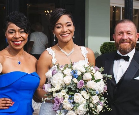  The journalist, fitness instructor, April Dupre (middle) with her mother and father.